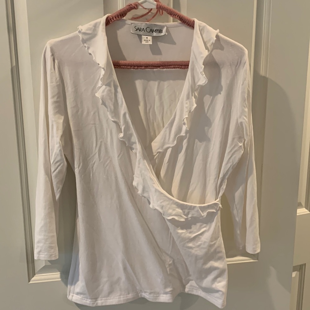 Sara Campbell, 3/4 sleeve tee. White. Size medium. Ruffle. Front wrap style